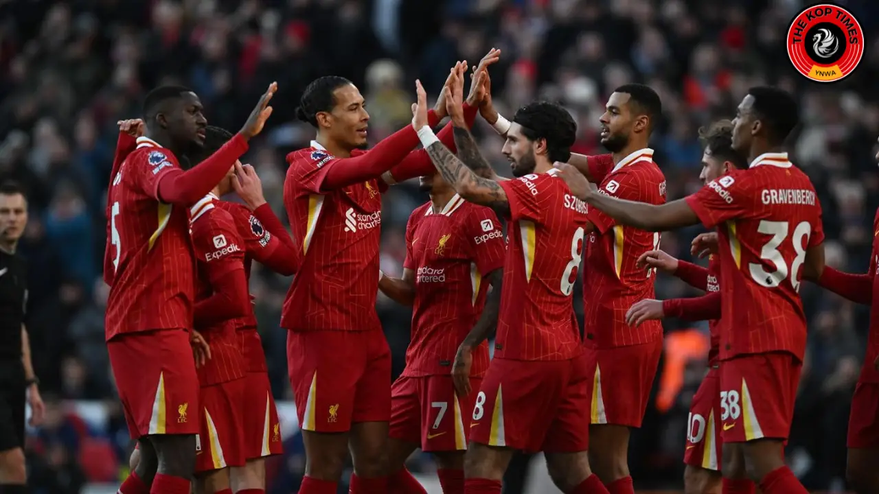Liverpool team celebrating their first goal against Ipswich Town, scored by Dominik Szoboszlai and assisted by Ibrahima Konate