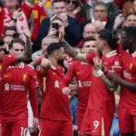 Liverpool players celebrate the penalty goal from Mohamed Salah against Southampton. Darwin Nunez won the penalty for the Reds during the 3-1 Premier League victory at Anfield.